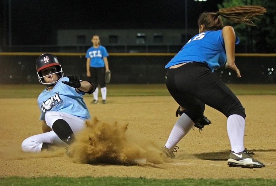 In the fall ball game against The Colony Senior Chelsea Thomas slides into 3rd Base. Photo By Steven Kent