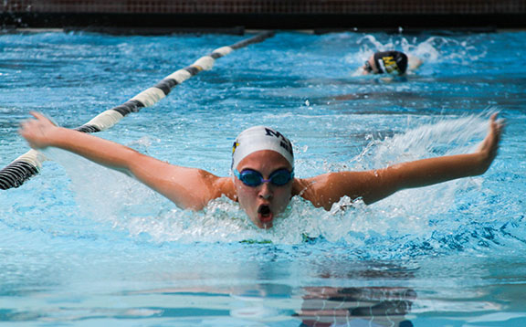 Team unity leads swimmers to win against Lovejoy