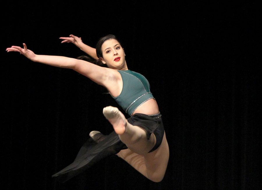 At the Marquette Winter Show, junior Brooke Naulty performs a dance routine.