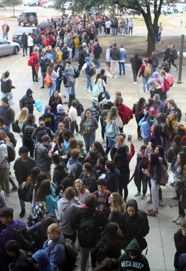 Students show up for the walkout as they try to raise awareness towards gun violence.
