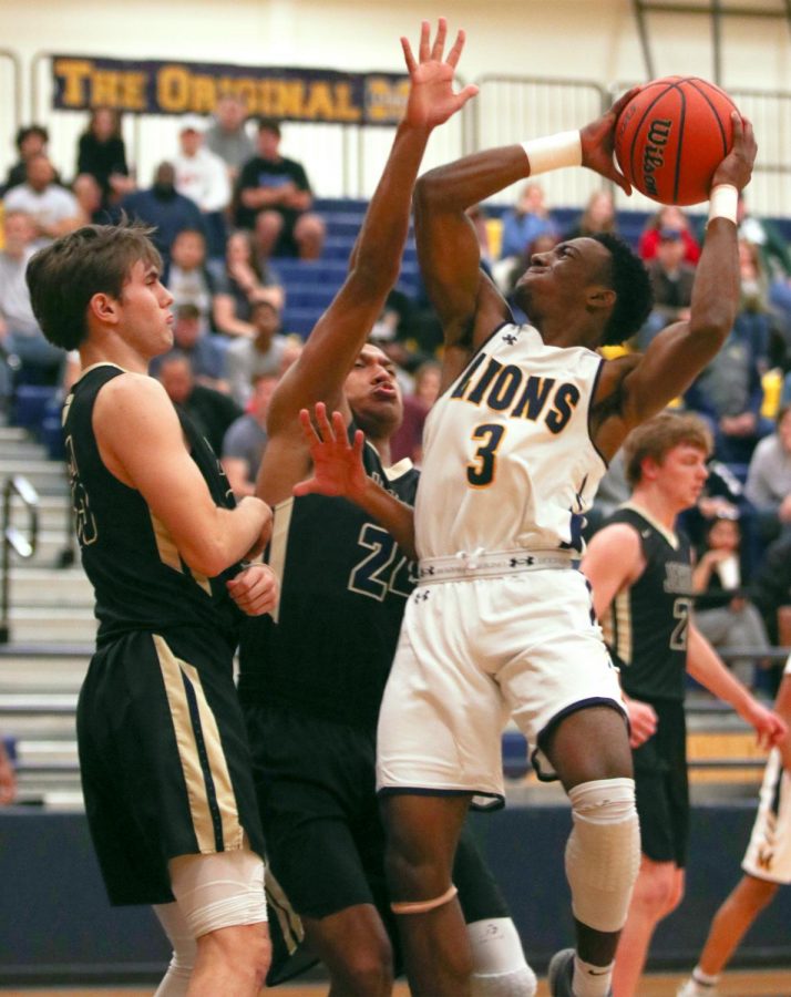 Andrew Pitts attempts a shot at the game against Dallas Jesuit Tuesday night.