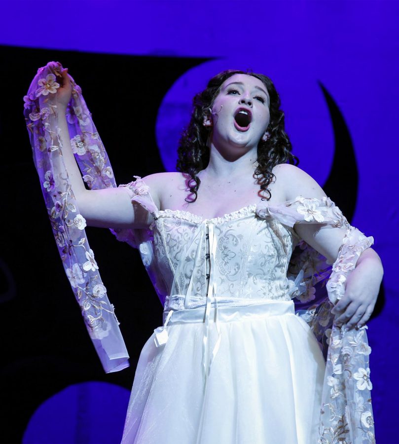 Maggie McGowan sings her solo in The Phantom of the Opera during rehearsal Wednesday night.