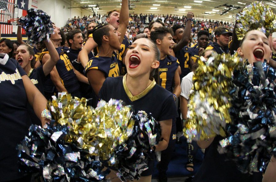 Kylie Dauper senior Marquette captain cheers during the victory chant with the senior class at the first pep rally.