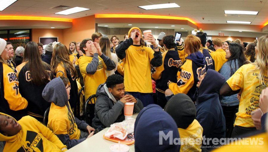 After the game, the students and team celebrate the win at the Eldorado Whataburger.