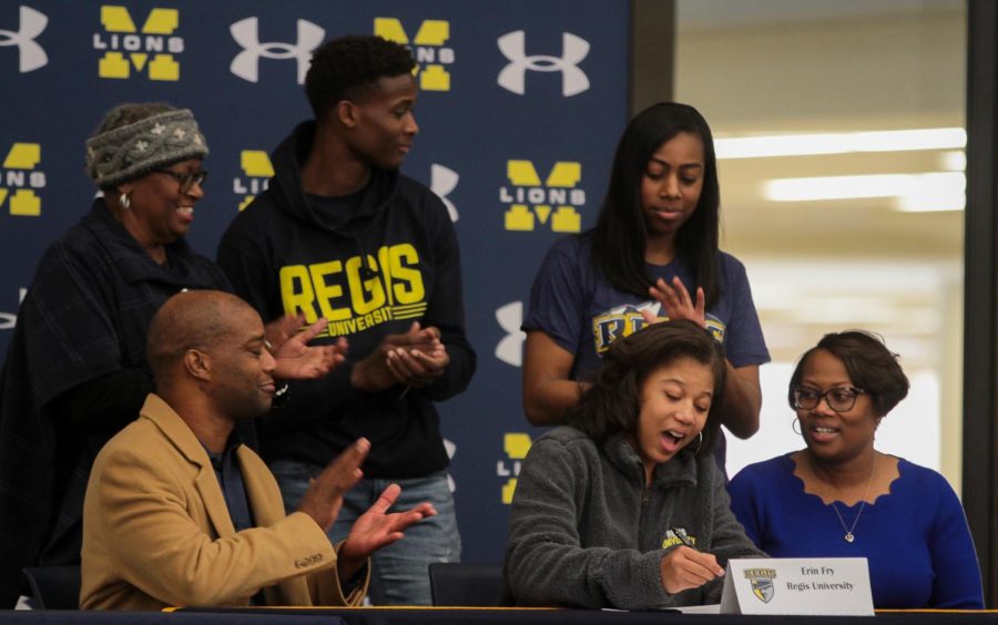 Erin Fry signs to Regis University for basketball.