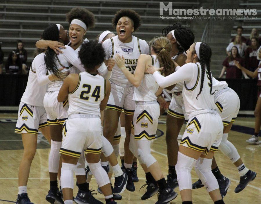 The basketball team celebrates after winning against Plano Senior 32-28, earning themselves a spot in the state tournament. 